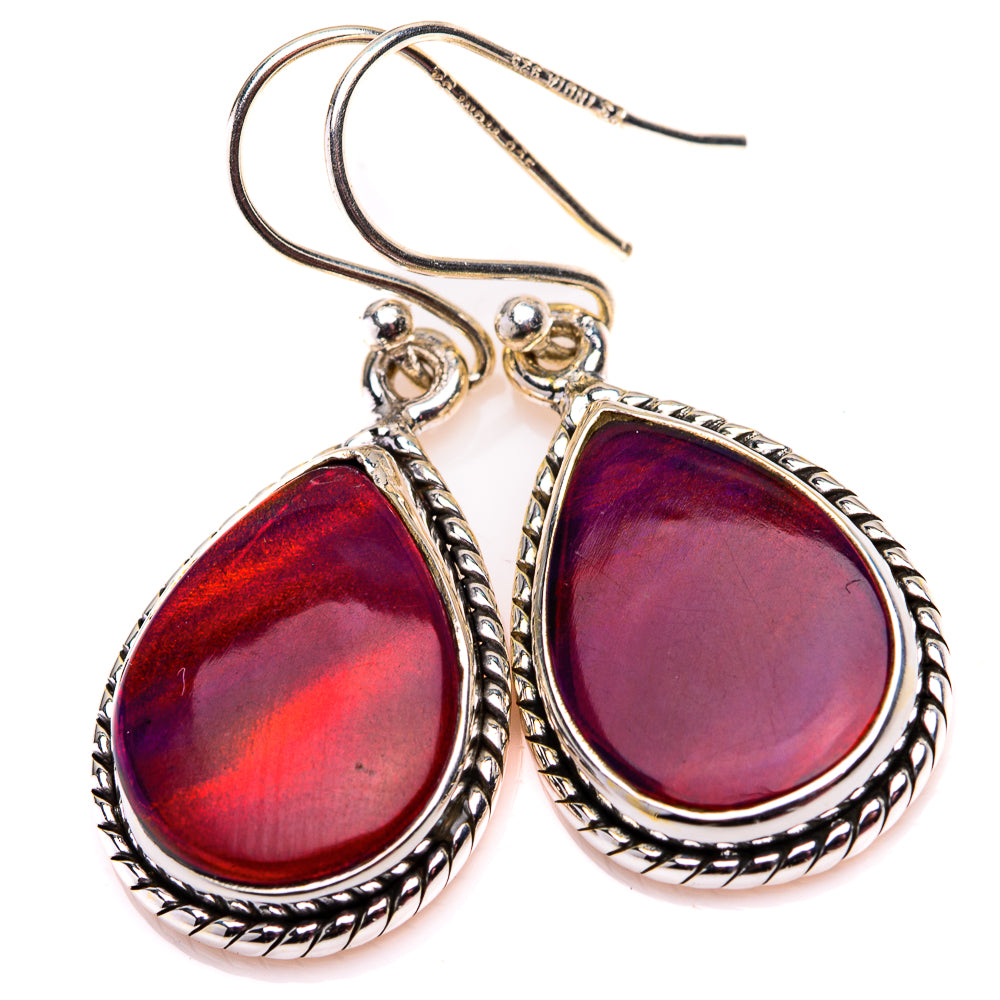 Teardrop opal-style earrings with red-purple cabochon stones and braided silver frames
