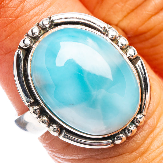 Oval larimar cabochon ring, light-blue stone in .925 sterling silver bezel