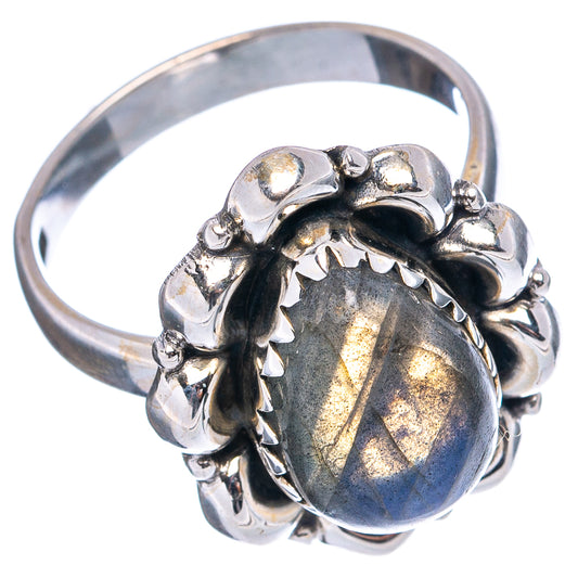 Sterling silver labradorite ring with ornate setting and two-tone oval gemstone