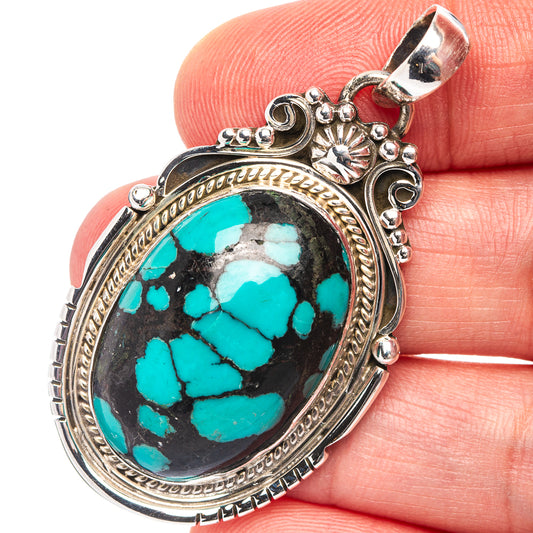 Sterling silver turquoise pendant with oval cabochon, ornate bezel and bail, .925 mark
