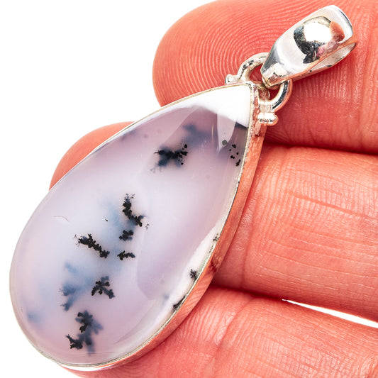Dendritic opal pendant in .925 sterling silver bezel with teardrop stone detail