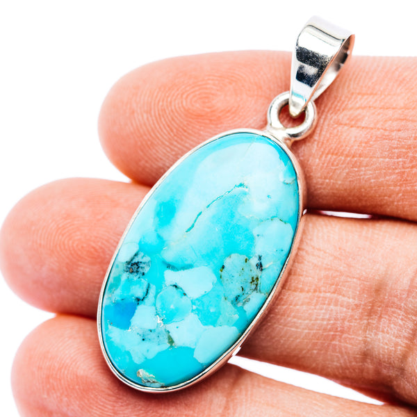 Oval Kingman turquoise cabochon pendant with .925 sterling silver bezel and bail