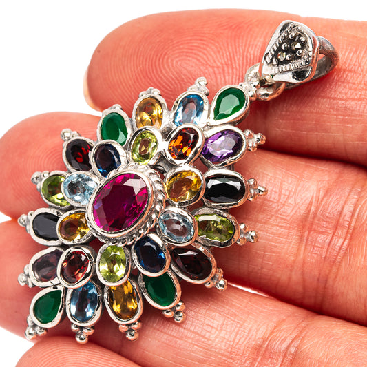 Sterling silver gemstone pendant with oval pink center and multicolor flower cluster