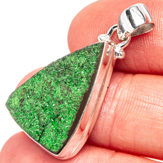 Sterling silver pendant with green rough garnet in bezel and loop bail