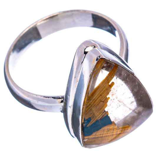 Sterling silver band with raised teardrop rutilated quartz cabochon, gold-brown striations.