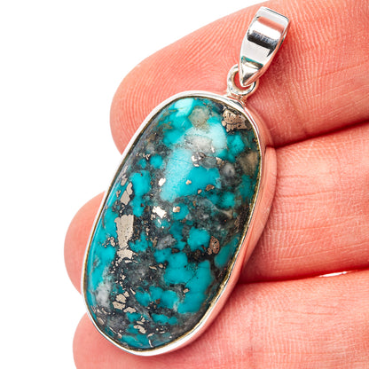 Oval turquoise pendant in .925 sterling silver with ridged bail, bezel set stone