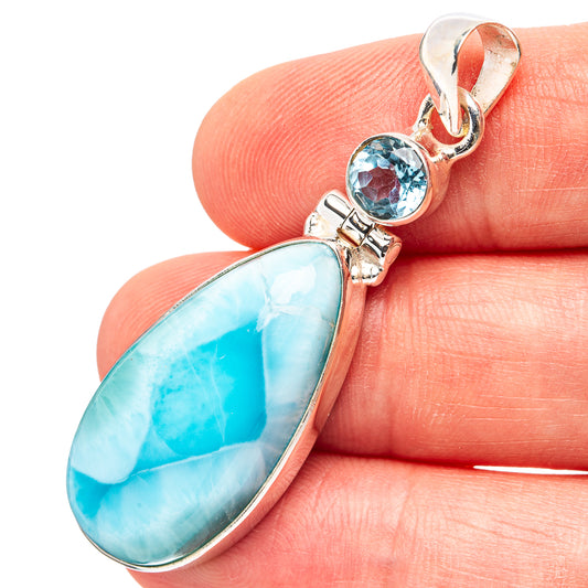 Sterling silver pendant with large blue Larimar oval and small round blue topaz