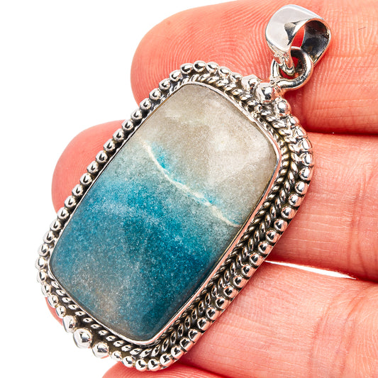 Sterling silver pendant with rectangular blue-green quartz stone, beaded edge bail