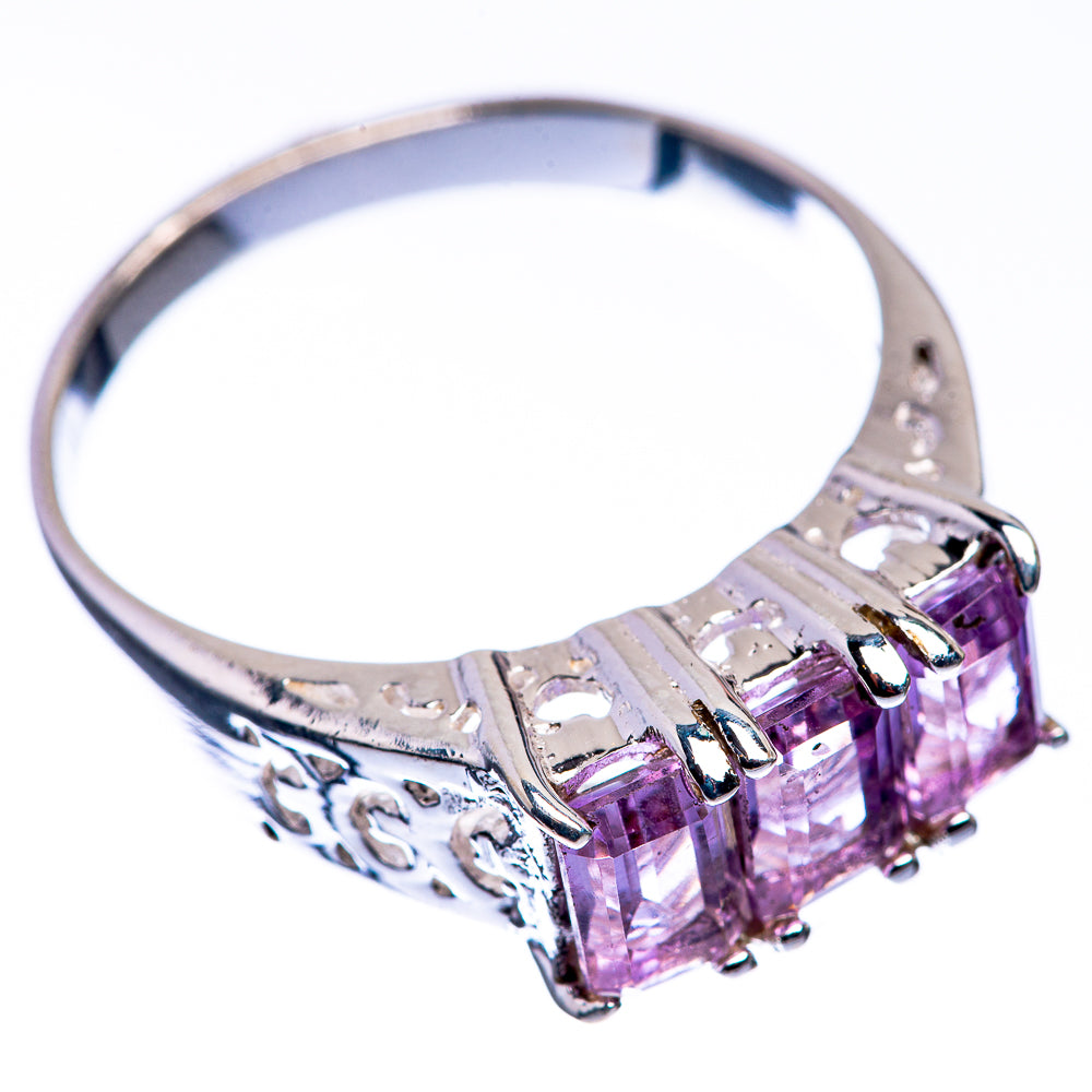 Sterling silver ring with four faceted pink amethyst squares in a row, prong-set band