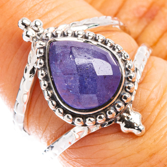 Oval purple gemstone halo ring; textured sterling silver with open side details