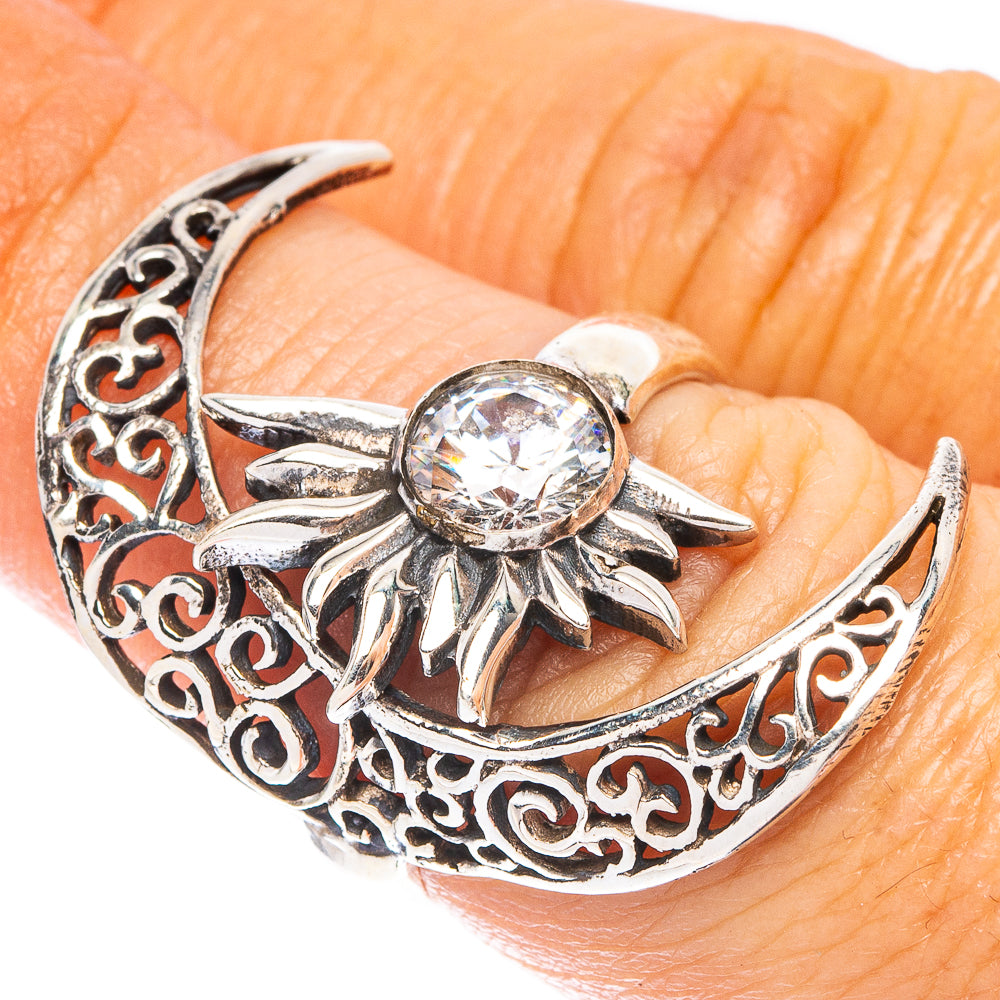 Adjustable 925 sterling silver moon sun ring with round crystal center, on finger