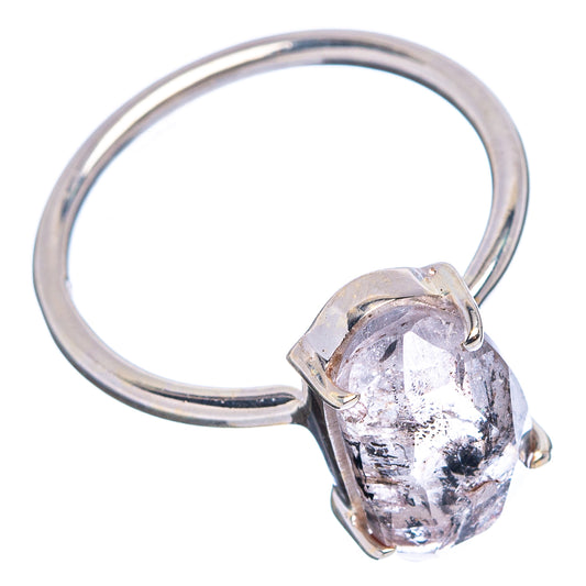 Faceted oval stone ring, .925 sterling silver band with clear stone and dark specks