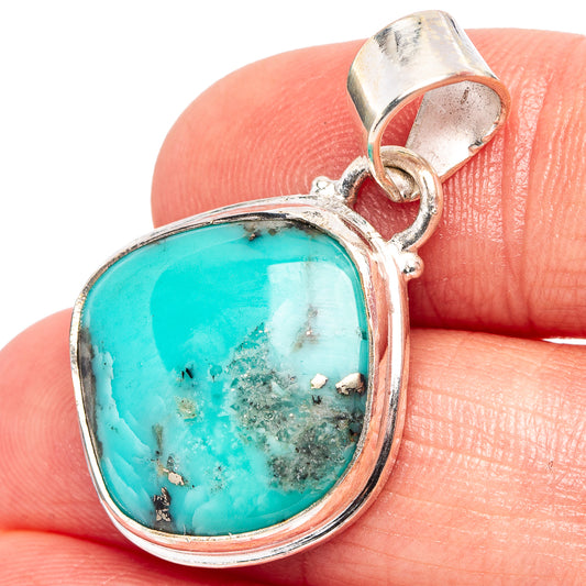 Sterling silver turquoise pendant with oval cabochon and bail, close-up