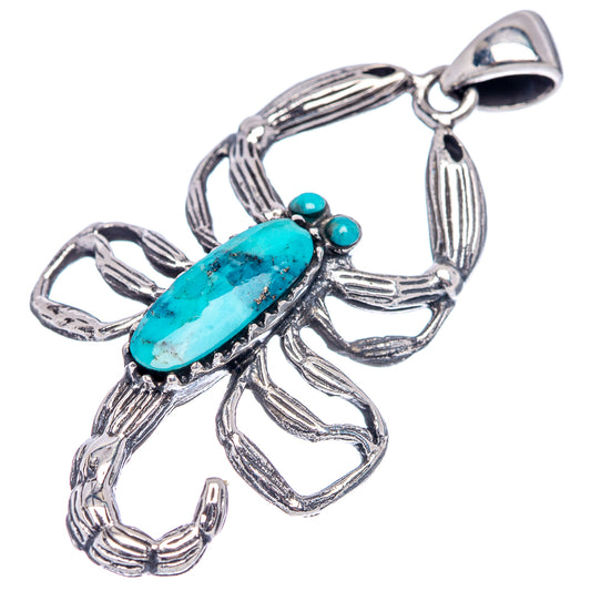 Sterling silver scorpion pendant with turquoise oval center stone and top loop bail