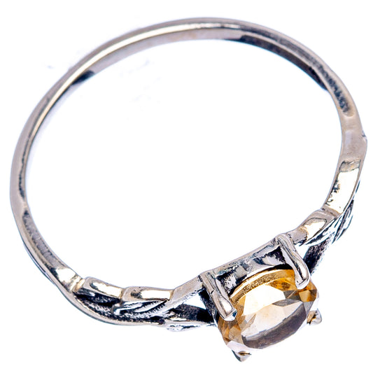 Sterling silver ring with citrine gemstone and twisted leaflike band details