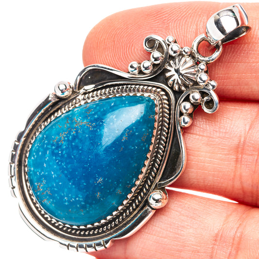 Sterling silver teardrop pendant with blue stone, rope border, and decorative bail