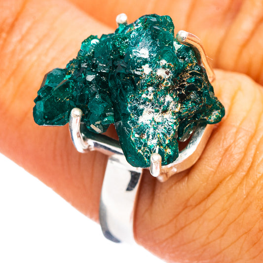 Sterling silver ring with raw green dioptase crystal, open prong setting