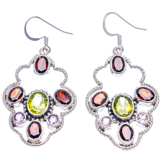 Sterling silver dangle earrings with green center gemstone, red and purple oval stones, filigree