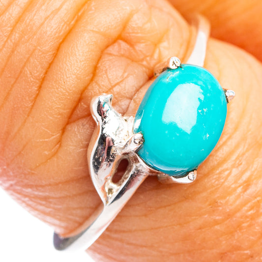 Turquoise oval gemstone bird ring, .925 sterling silver, on finger, size 7.5