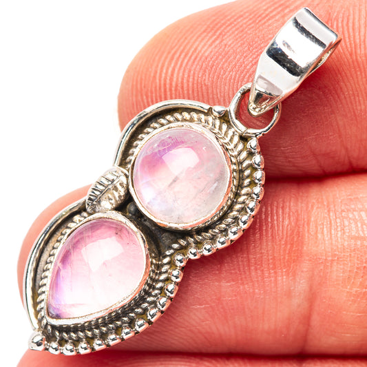 Pink moonstone pendant with two oval pink cabochon stones, .925 sterling silver setting