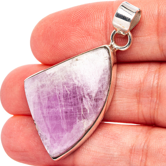 Kunzite pendant with purple teardrop gemstone set in .925 sterling silver bail