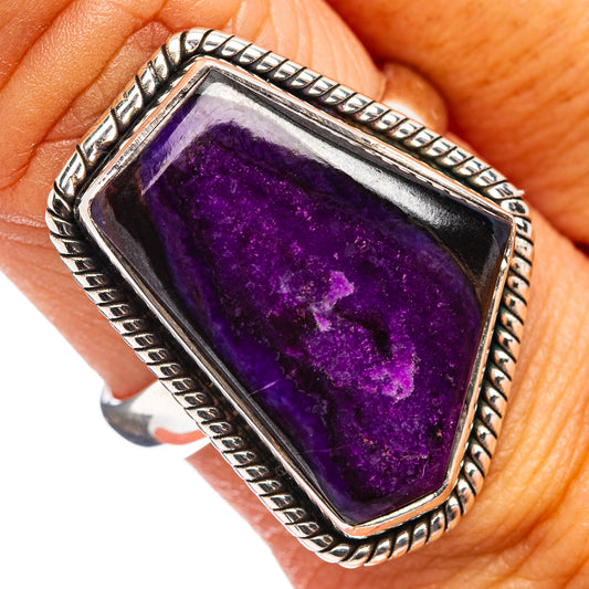 Sterling silver sugilite ring with dark purple rectangular stone bezel, rope border
