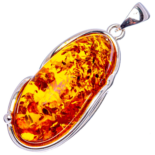 Oval Baltic amber cabochon pendant in .925 sterling silver bezel setting