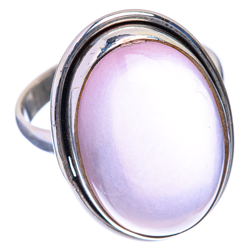 Oval rose quartz cabochon ring with sterling silver oval frame, side view
