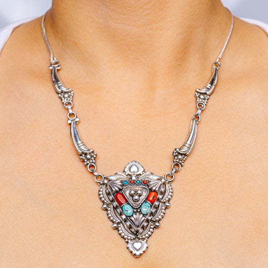 Sterling silver pendant necklace with red and turquoise inlay stones and filigree
