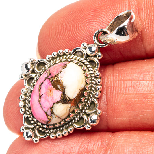 Oval pink and white gemstone pendant with textured .925 sterling silver setting and bail