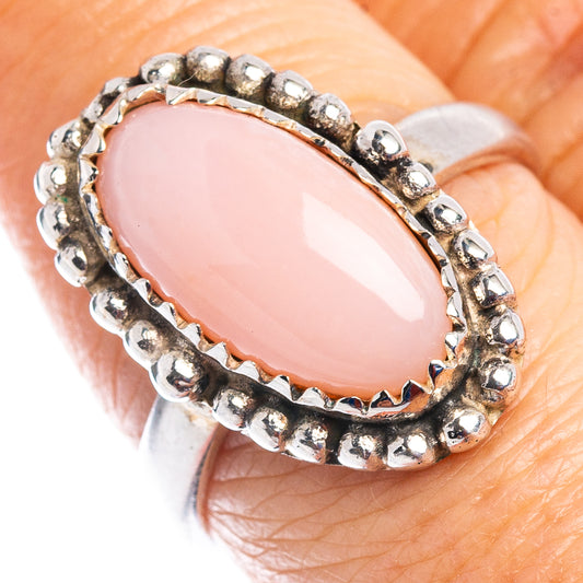 Oval pink opal ring with beaded .925 sterling silver band, size 7.75
