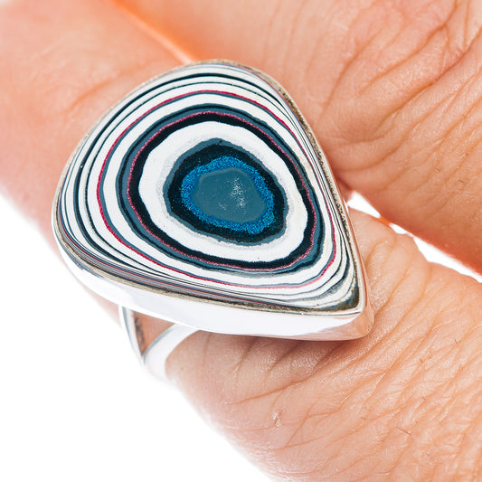 Sterling silver teardrop ring with layered stripe inlay and blue center stone