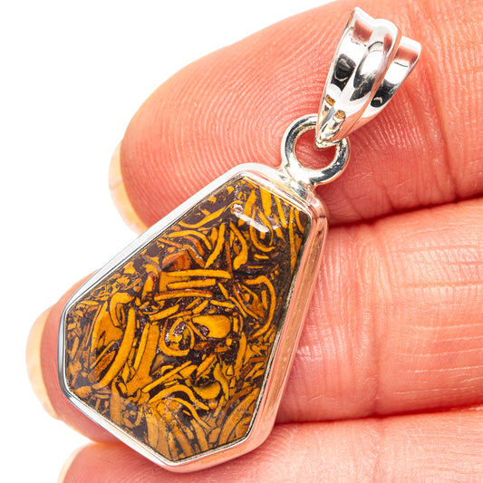 Sterling silver pendant with amber fossil jasper stone in dark brown bezel