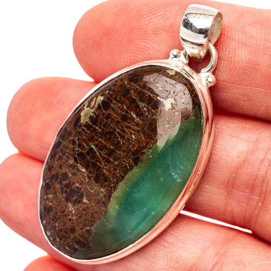 Boulder chrysoprase pendant with oval green-and-brown stone in .925 sterling silver bezel