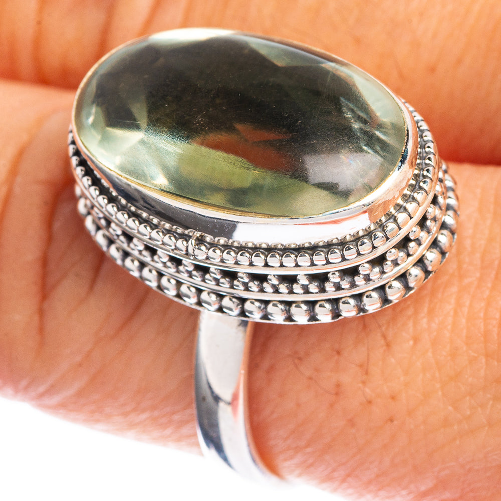 Sterling silver ring with oval green faceted amethyst and beaded double band