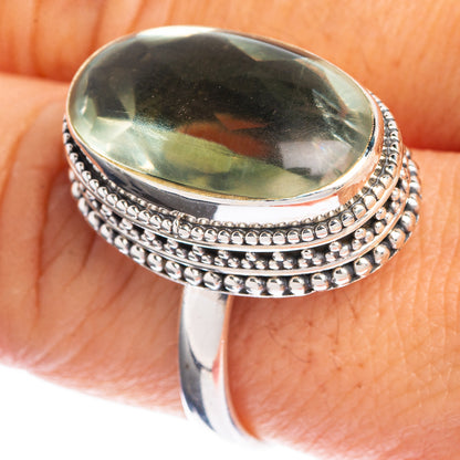 Sterling silver ring with oval green faceted amethyst and beaded double band