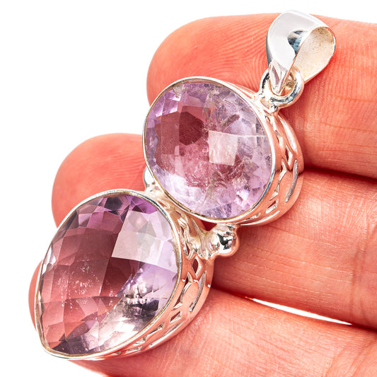 Amethyst pendant with oval faceted gemstone set in .925 sterling silver with bail