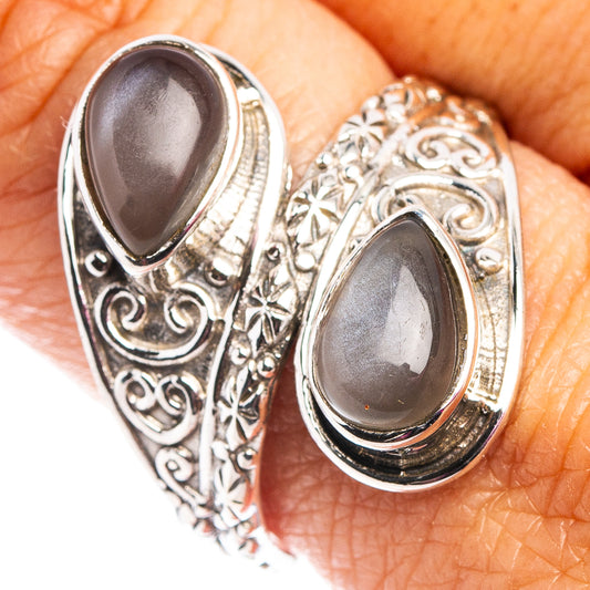 Grey moonstone double-teardrop ring in 925 sterling silver with ornate scroll detailing