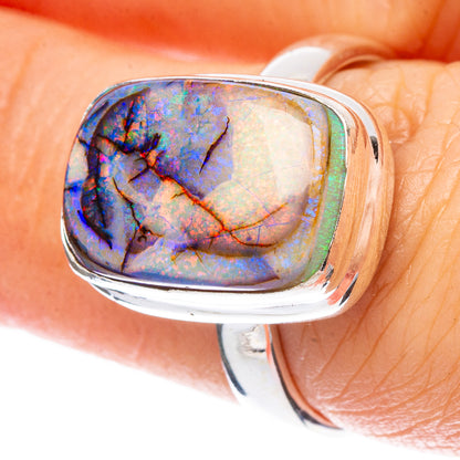 Sterling silver opal ring with oval bezel, blue and purple iridescent stone