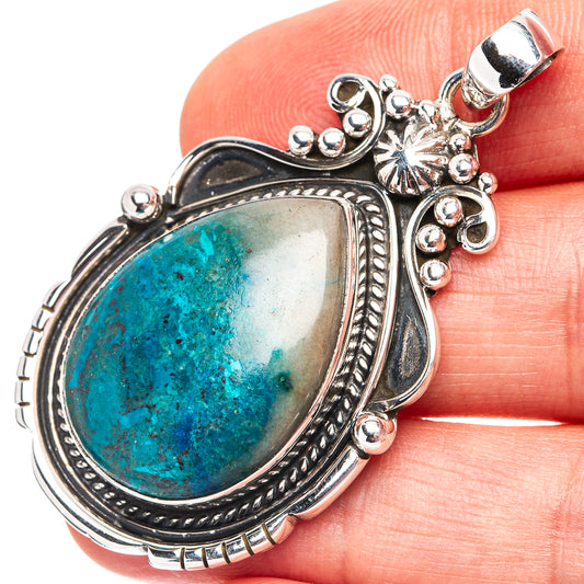 Apatite pendant in .925 sterling silver with teardrop blue-green stone and ornate frame