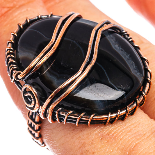 Oxidized copper wire wrap ring with black banded agate cabochon, size 7.5