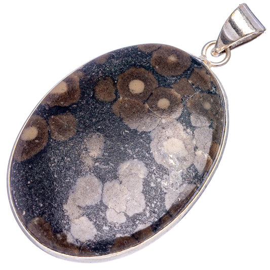 Silver-plated teardrop pendant with dark stone and white-gray mottled patches