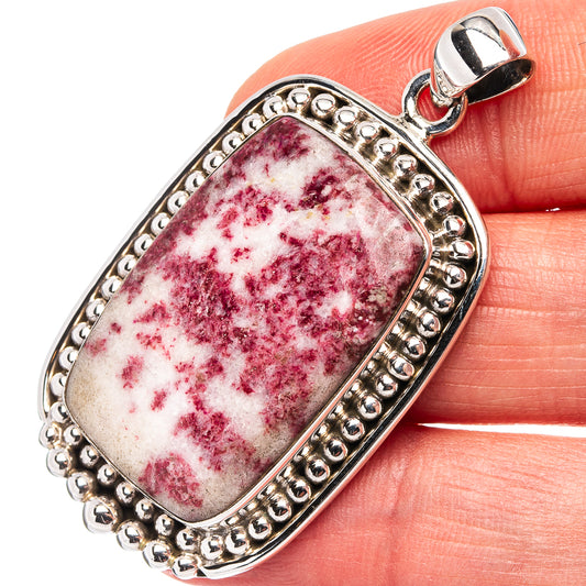 Cinnabar in dolomite pendant with red-and-white marbled square stone in silver bead border