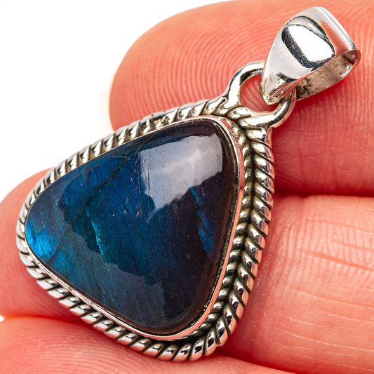 Sterling silver labradorite heart pendant with blue flash gemstone and braided border