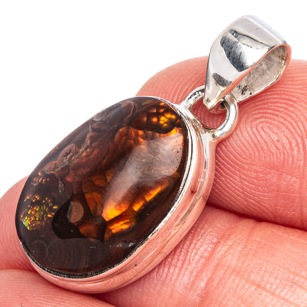 Sterling silver fire agate pendant, oval dark red-brown stone with fiery orange pattern