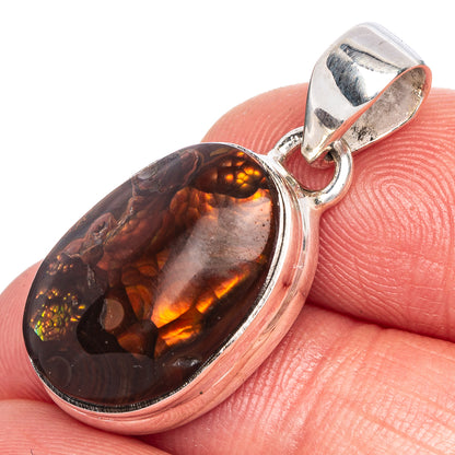 Sterling silver fire agate pendant, oval dark red-brown stone with fiery orange pattern