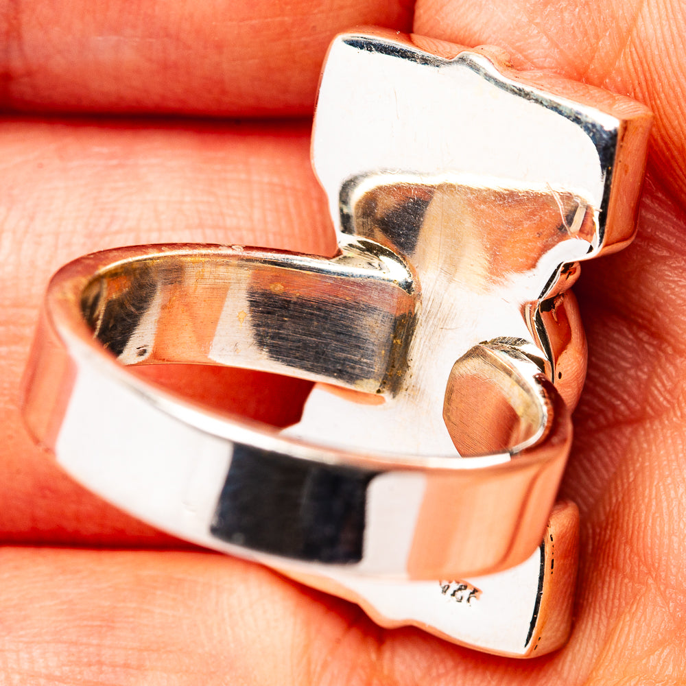 Adjustable sterling silver ring band with stamped metal detail