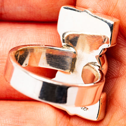 Adjustable sterling silver ring band with stamped metal detail
