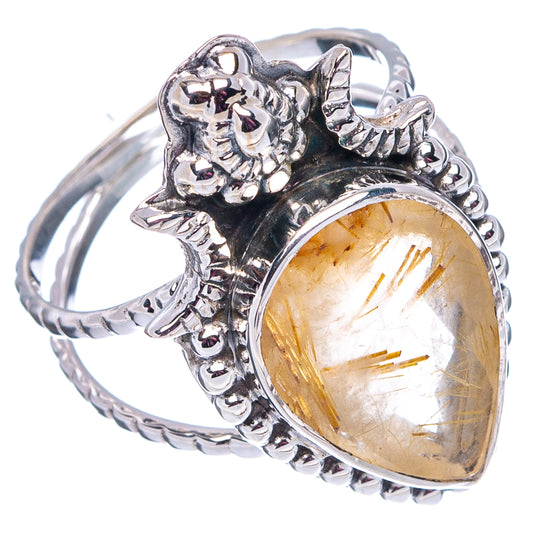 Sterling silver rutilated quartz ring with detailed animal-head motif and oval crystal bezel
