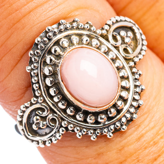 Sterling silver ring with pink opal and beaded halo, size 7.5